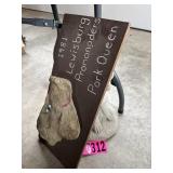 Flowerbed dog decor and statue