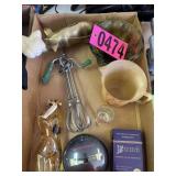 Flat of brass pig bank, vintage hand egg beater,