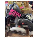 Flat with Craftsman circ saw and large flashlight