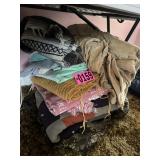 Stack of blankets and throw