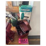 Red metal tool box, zip ties, & button kapp