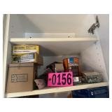 Shelf contents: Assorted screws, fasteners, &