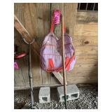 Purple bag + garden pitchfork