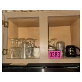Cabinet contents: wine glasses, tumblers, coffee