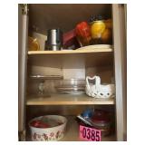 Cabinet contents: glass cake stand, serving