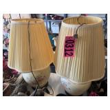 Pair of floral ceramic lamps with pleated shades