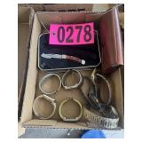 Box lot: pocket knife, ladies cuff watches, and