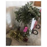 Artificial greenery in planters