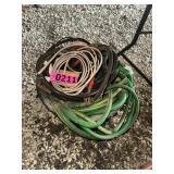 Large lot of hoses, cables, extension cords, and