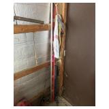 Contents of corner: level, crow bar, tarp straps