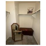 Closet contents: framed wall mirrors, wood