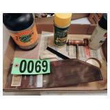 Flat of assorted gun cleaning supplies muzzle