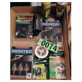 Flat of assorted gun cleaning supplies broadheads