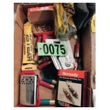 Flat of assorted gun cleaning supplies shotgun