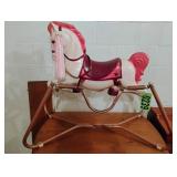 White and pink rocking horse