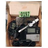 Flat of assorted phones and curling iron