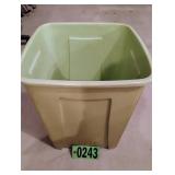 Small green trash can