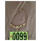 Gold toned gem womens necklace