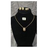 Gold toned intricate floral design necklace,