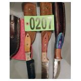 3 knives with covers