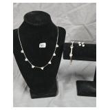 Sliver toned necklace, bracelet and earrings set