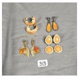 (4) sets of earrings featuring orange settings