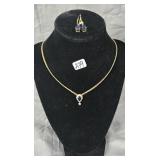 Gold toned necklace with blue sapphire and