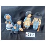 Porcelain Amish dolls and figures