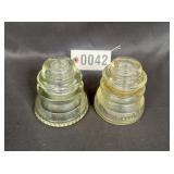 (2) clear glass insulators
