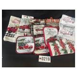 Lot of Christmas kitchen towels and hot pads