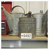 Metal sprinkling can and gas cans