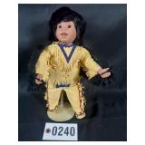 Vintage Native American doll with vinyl head and