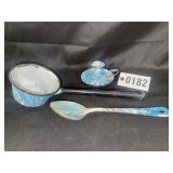 Blue and white graniteware ladle, spoon, and