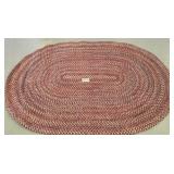 Red oval rug