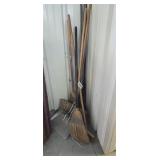 Brooms, mop handle, metal dustpan, rebar and