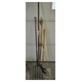 (2) handy sythes and (2) pitch forks