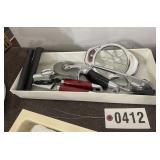 Plastic tray w/ can opener, pizza cutter, & apple