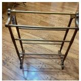 Maple finish wooden quilt rack