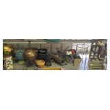 Contents of floor under shelf - yard ornaments