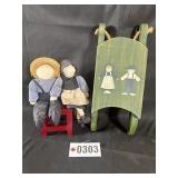Wood sled, chair, and plush Amish dolls
