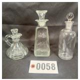 (3) clear glass cruets w/ stoppers