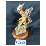 Porcelain Native American statue on attached wood