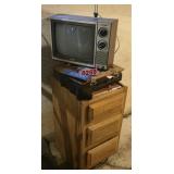 Old portable TV and cabinet