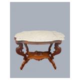 Walnut carved parlor table with figural dog and