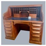 Walnut "S" Roll top desk. (10) drawer base,