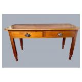 Walnut library style table with flat-back edge,