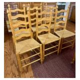 (6) ladder-back wicker chairs