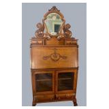 Oak, mirrored, drop-front secretary with sealion