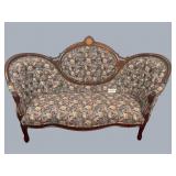 Rose patterned, upholstered parlor Settee with