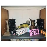 Contents of Shelf - Cars / Bobcat / Brass Pitcher